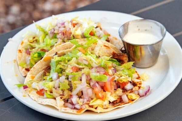 Closeup of jerk chicken tacos in Turks and Caicos. 