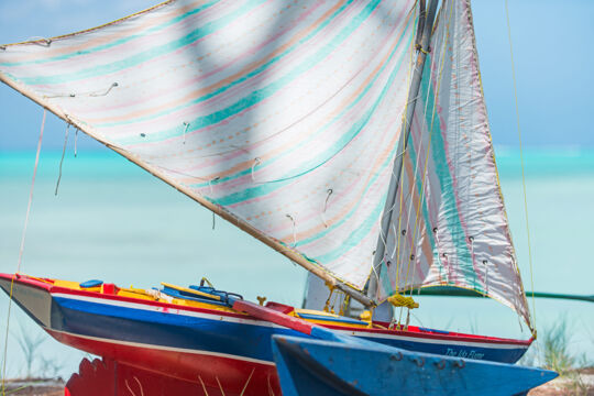 Close up of a model sailboat on Bambarra Beach, Middle Caicos. 