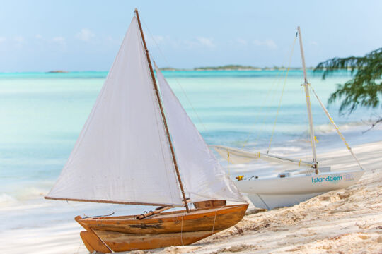 Model sailboats on Bambarra Beach.