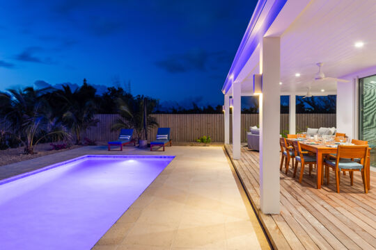 Pool and terrace at Villa Alee at dusk