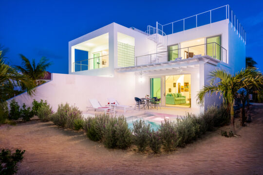 Exterior of Villa Sandpiper at dusk