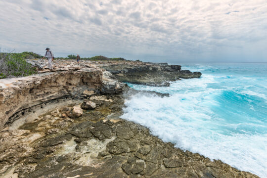 Cliffs and surf in the West Caicos Marine National Park in the Turks and Caicos
